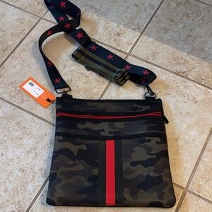 Haute Shore neoprene Camouflage Crossbody Bag with Red Accents. 2 straps
